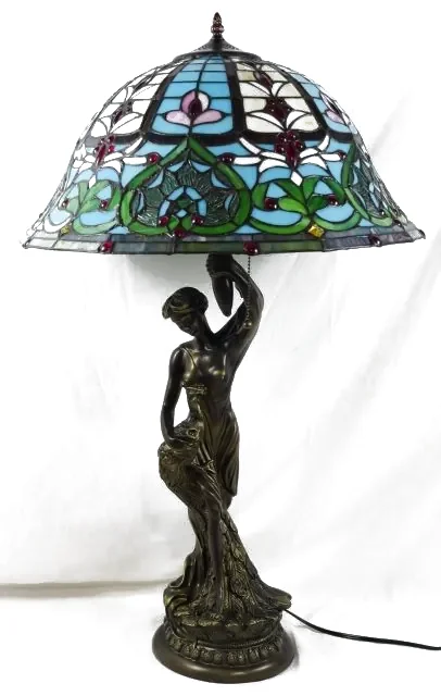 Stained glass figural lamp