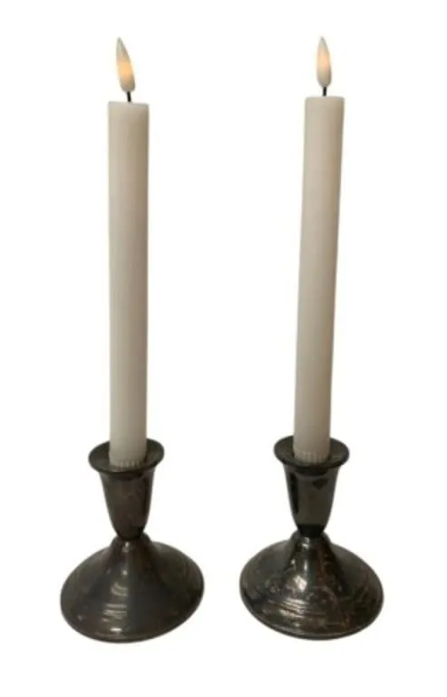 Pair of weighted sterling silver candlesticks