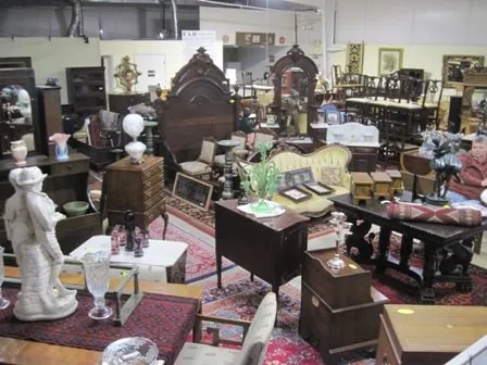 The B&H sale floor lined with Victorian furniture